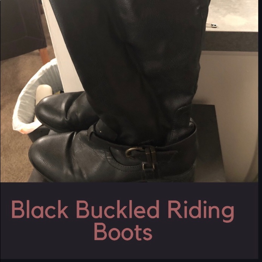 Black buckled riding boots